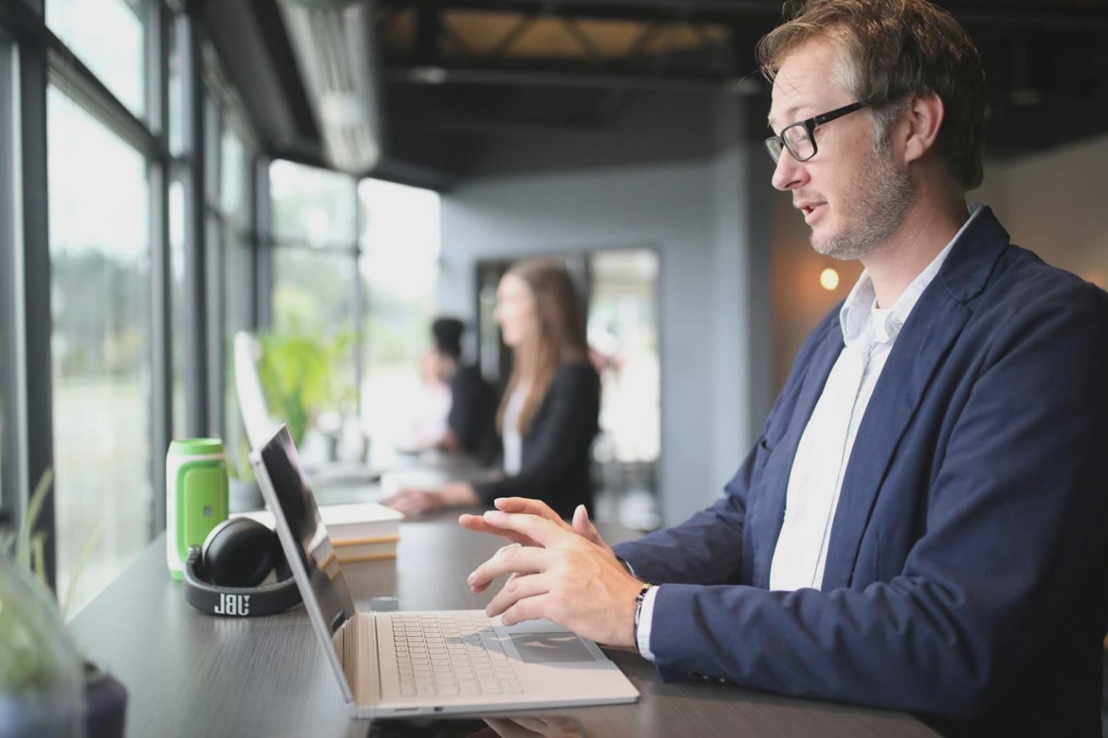 Business professional reviewing financial documents and planning strategies