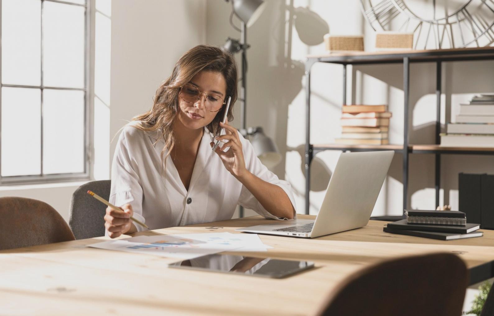 Business professionals reviewing financial documents and strategies